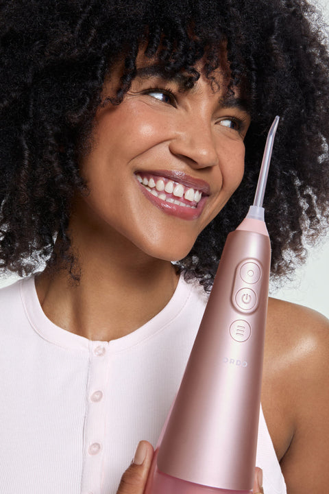 Removes more plaque than brushing alone